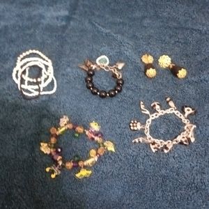 Group of bracelets and pair of Vintage clip-on earrings.